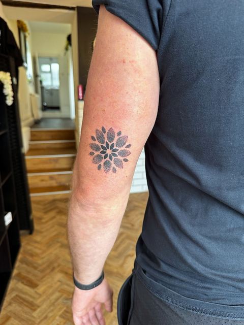 Dotwork mandala on the arm